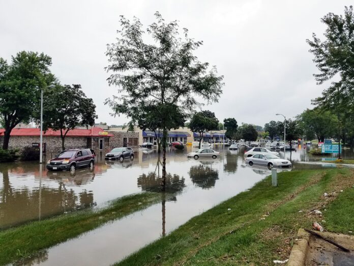 Photo by jim gade cars on flooded street