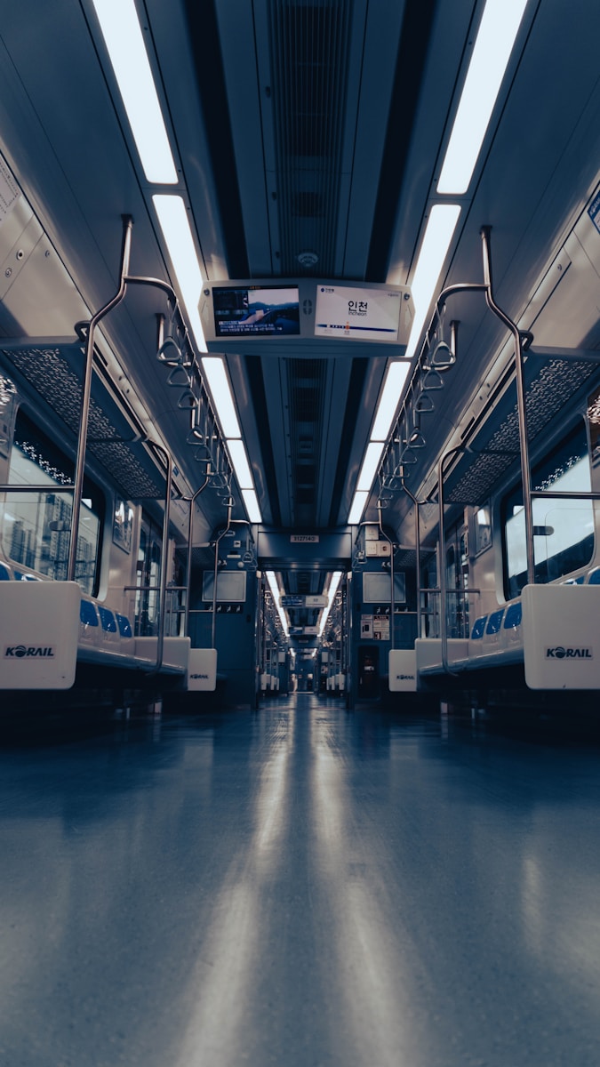Photo by Fukuro 0wl a long empty train car with no people on it