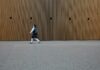 일상 속에 스며드는 웰니스 문화, 건강 트렌드와 실천법 woman in uniform walkin on gray concrete pavement during daytime